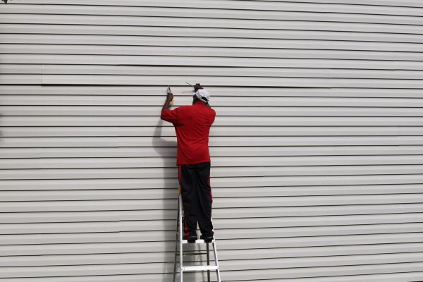 Loose Siding Repair in Tomball