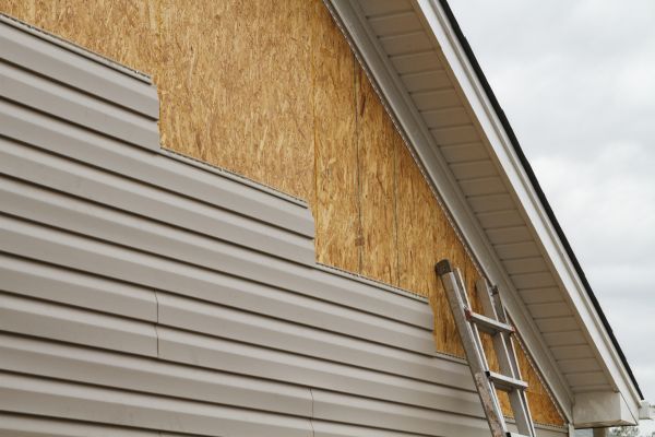 Grey Vinyl Siding Installation in Tomball