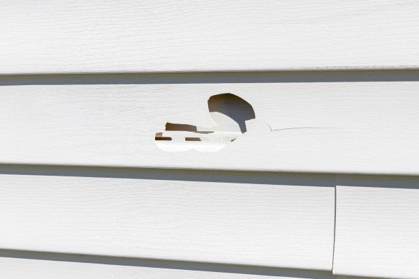 White Vinyl Siding Repair in Tomball